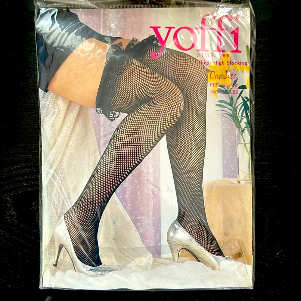 Thigh high black fishnet stockings